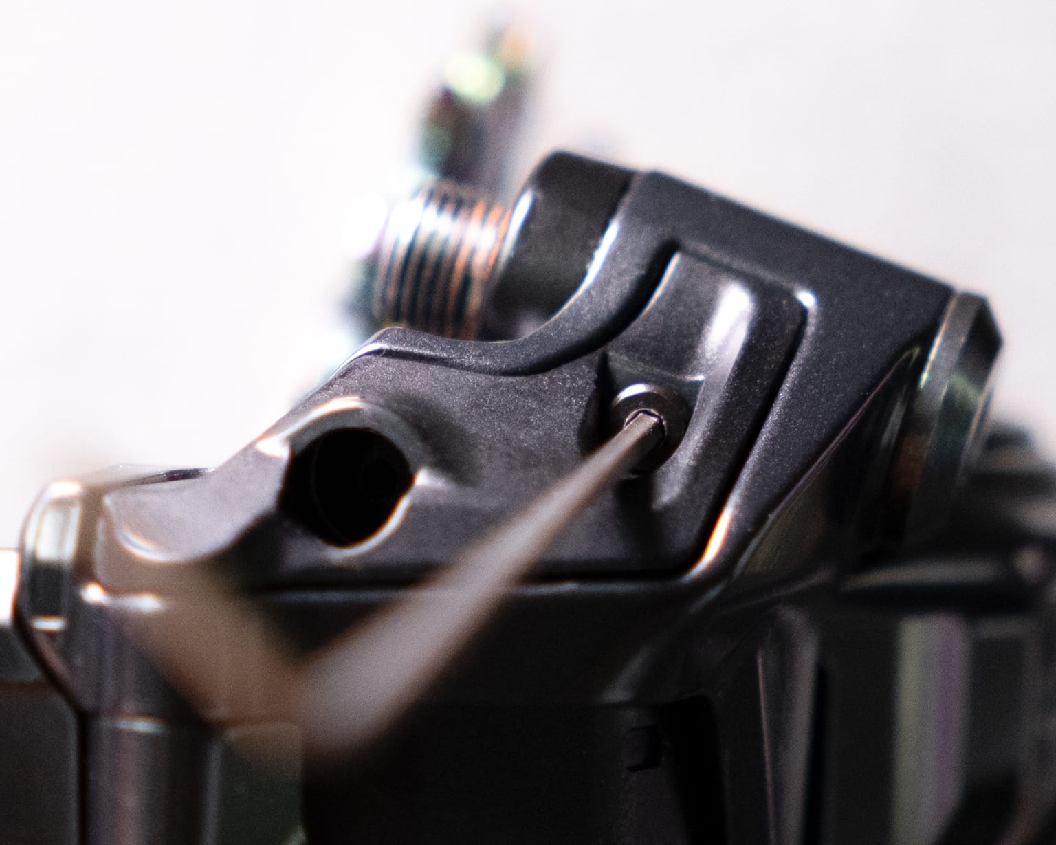 Use a #2 hex key to remove this screw